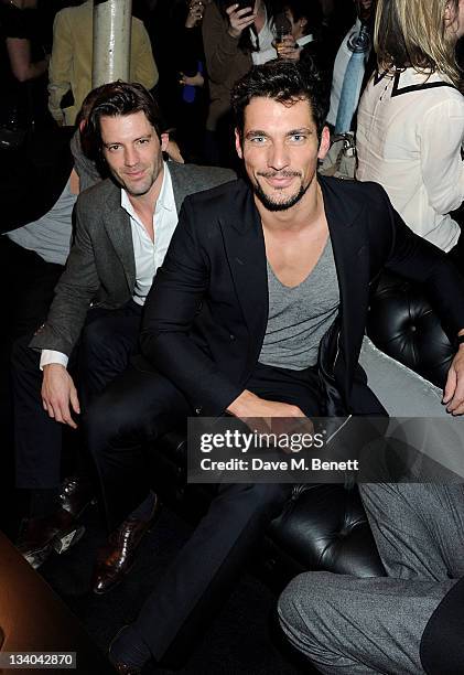 Models Louis Dowler and David Gandy attend the launch of the Vertu Constellation, the luxury mobile phone maker's first touchscreen handset, at the...