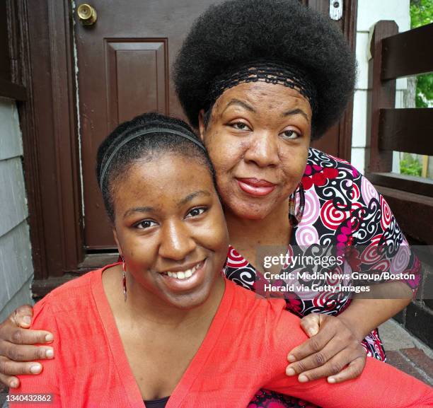 Honor student Esteniolla Maitre is seen with her mother Belene Daniel at her Mattapan home, May 28, 2011.Staff Photo by Mark Garfinkel