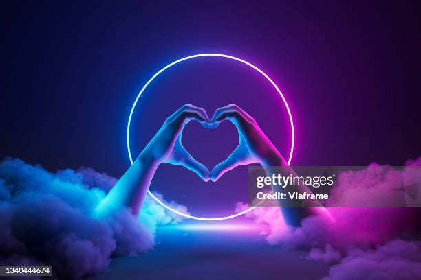 neon hands heart - forgiveness stock pictures, royalty-free photos & images