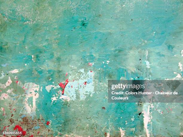 weathered and textured turquoise and white paints on rusty metal in paris - pátina fotografías e imágenes de stock