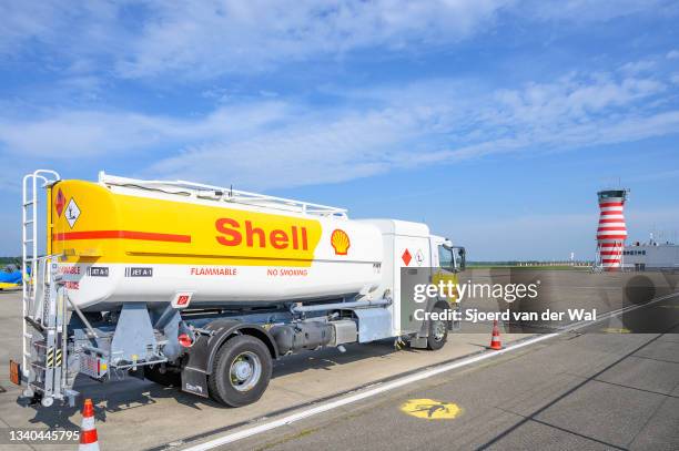 Shell aviation jet fuel truck at the tarmac of Lelystad airport with the air traffic control tower in the background on September 14, 2021 in...