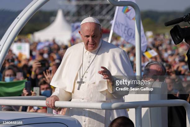 Pope Francis rides his Pope mobile through a crowd of pilgrims before holding an open-air mass on September 15, 2021 in Sastin, Slovakia. Today's...