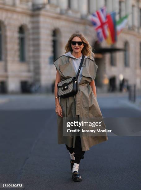 Zein Kurdi is seen wearing a denim vest, Snidel skirt, vintage Chanel  News Photo - Getty Images