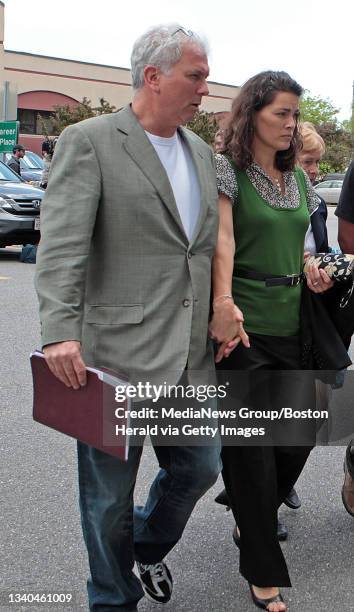 Woburn, MA) Nancy Kerrigan, her husband Jerry Solomon and her mother Brenda leave the courthouse after the verdict. The jury found Mark Kerrigan not...