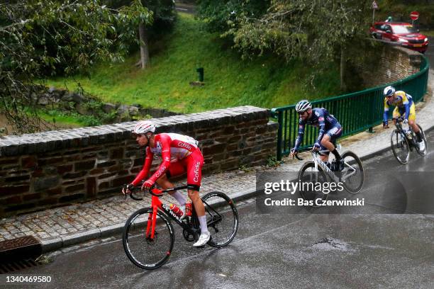 Anthony Perez of France and Team Cofidis and Lubomir Petrus of Czech Republic and Team Alpecin-Fenix compete in the rain during the 81st Skoda-Tour...