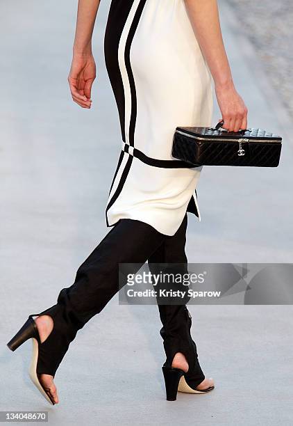 Model walks the runway during the Chanel 'Collection Croisiere 2012' show on May 9, 2011 in Cap d'Antibes, France.