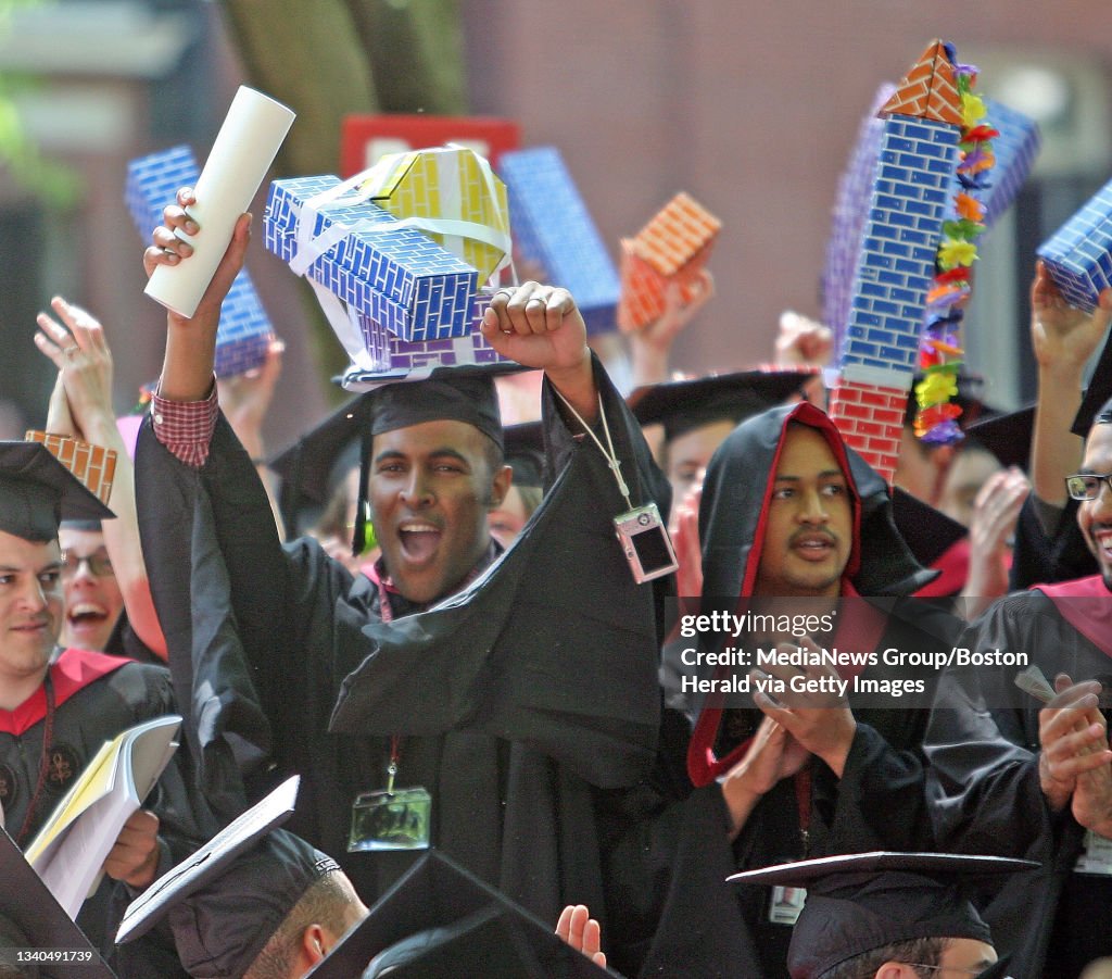 (6/4/09-Cambridge, Mass.)Harvard School of Design students celebrate with their big mortar boards after being conferred at the Harvard University Commencement in Harvard Yard.  (staff photo by stuart cahill)  saved in fri