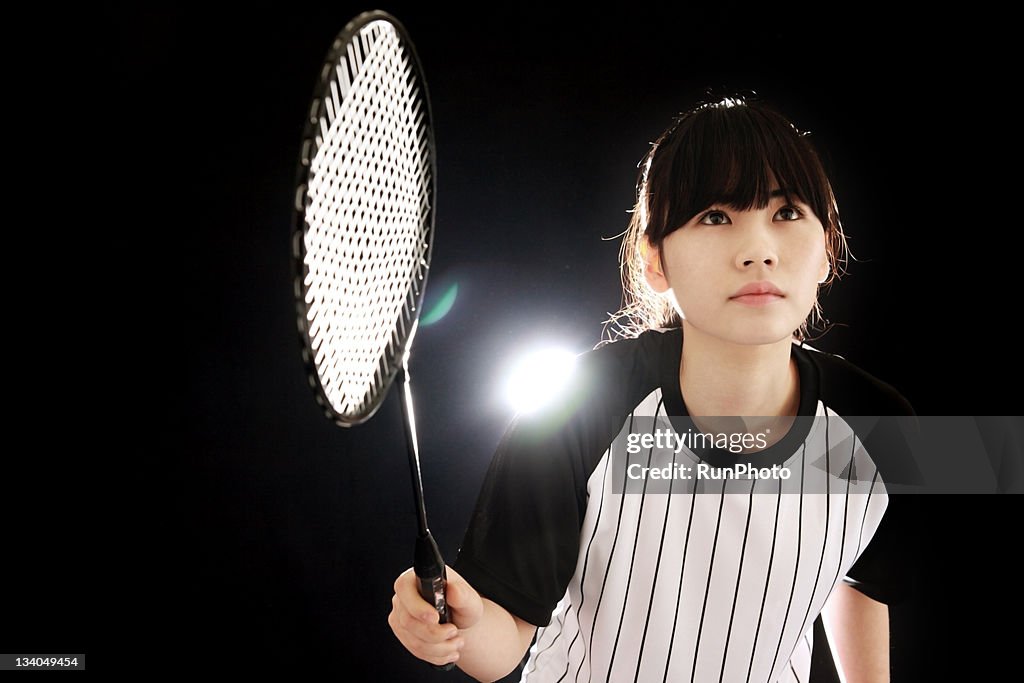 Young woman training,badminton