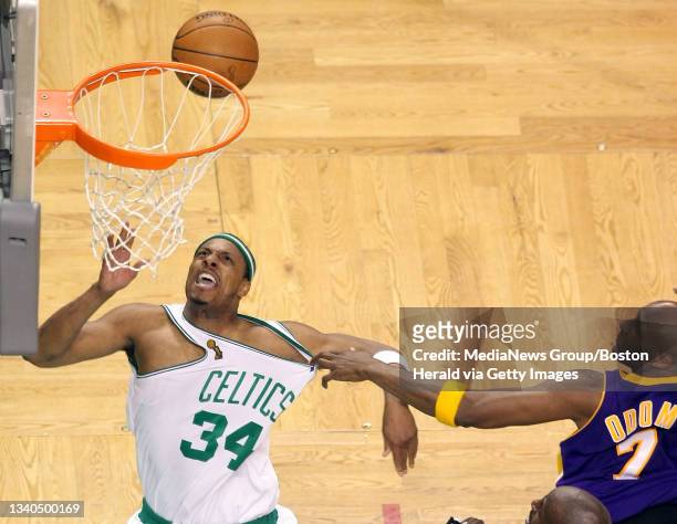 Boston Celtics forward Paul Pierce got his his shirt pulled as he fought Los Angeles Lakers forward Lamar Odom for a defensive rebound in the 4th...
