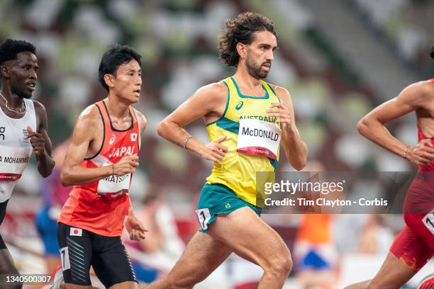 August 3: Morgan McDonald of Australia and Hiroki Matsueda of Japan in action during the Men's 5000m round one heat two race at the Olympic Stadium...