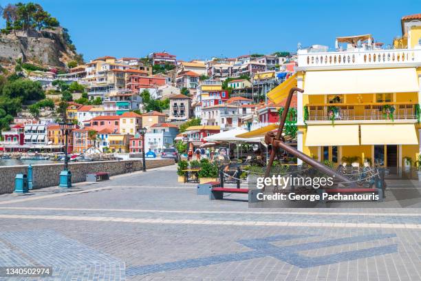 main square in the harbor of parga, greece - epirus greece fotografías e imágenes de stock