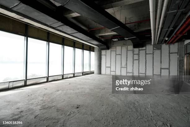 interior view of unfinished office building - unbebautes grundstück stock-fotos und bilder