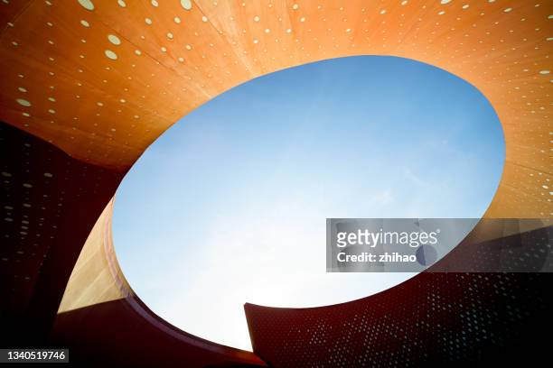 the red ceiling forms an oval sky - q stock pictures, royalty-free photos & images