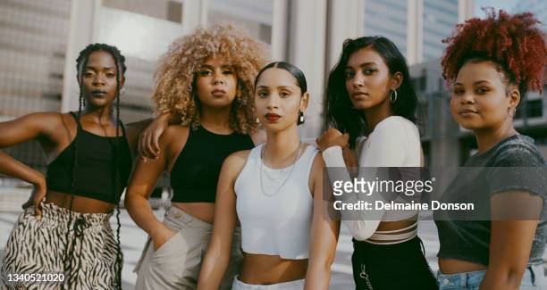 shot of a diverse group of women posing in the city together during the day - cliqueimages stock pictures, royalty-free photos & images