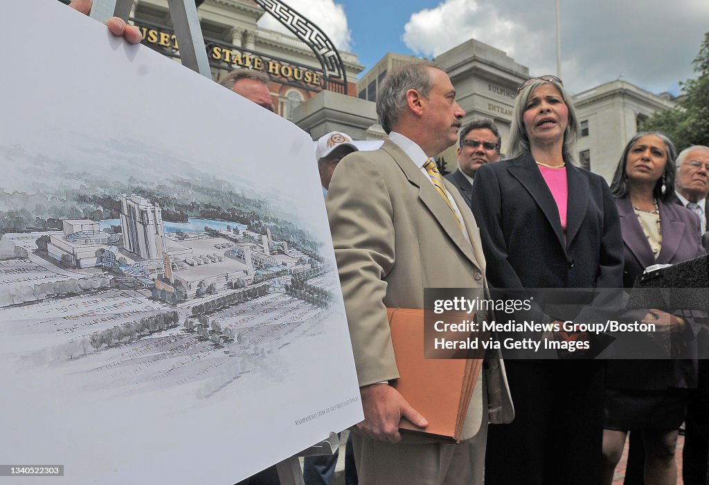 (06/08/10 Boston, MA) Aquinnah Wampanoag Gaming Corp. Chairwoman Naomi Carney speaks to repoerts (C) near a rendering of a Wampanoag Entertainment Complex as attrny. Richard Bennett (L) and Wampanoag Tribe of Gay Head Aquinnah Chairwoman Cheryl A