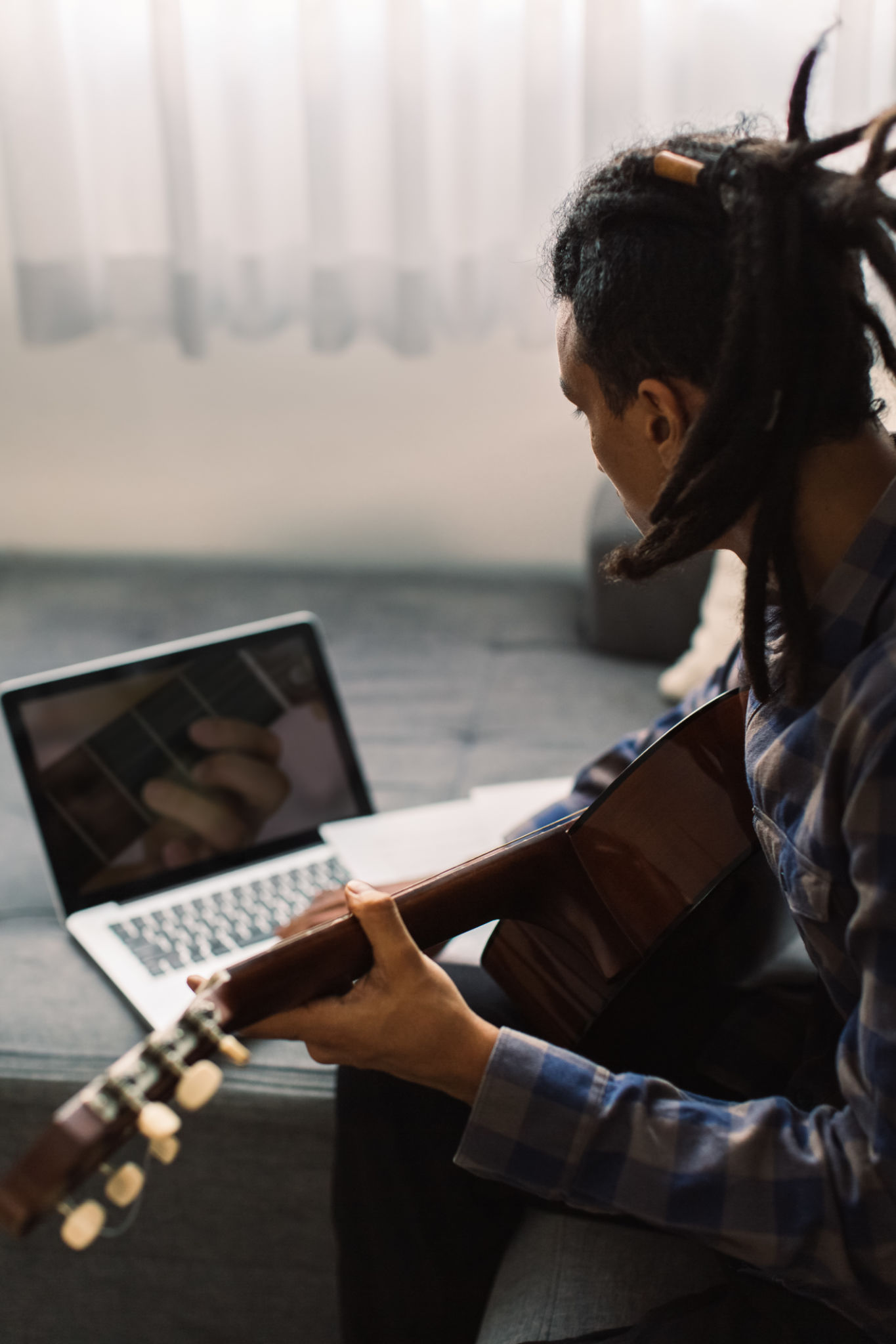 musician working on laptop