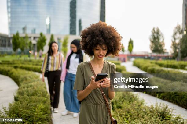 woman using mobile phone - holy city park bildbanksfoton och bilder