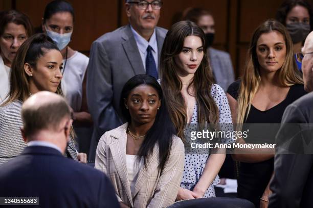 Olympic Gymnasts Aly Raisman, Simone Biles, McKayla Maroney and NCAA and world champion gymnast Maggie Nichols are approached by Sen. Pat Leahy after...