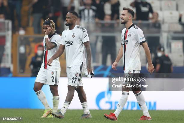 Valentin Rosier, Cyle Larin and Kenan Karaman of Besiktas look dejected following defeat in the UEFA Champions League group C match between Besiktas...