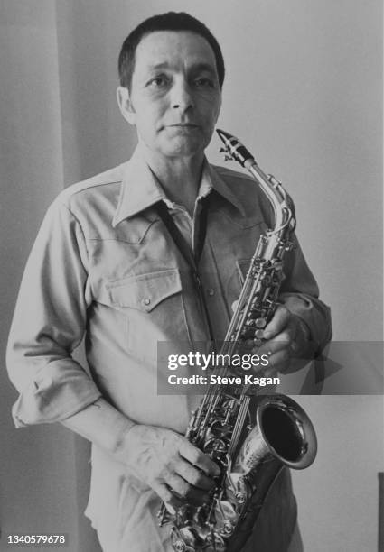 Portrait of American Jazz musician Art Pepper as he poses with his alto saxophone, Chicago, Illinois, August 1979.