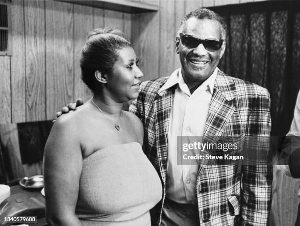 View of American R&B and Pop singers Aretha Franklin and Ray Charles backstage at ChicagoFest, Chicago, Illinois, August 1980.