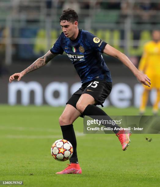 Alessandro Bastoni of FC Internazionale in action during the UEFA Champions League group D match between Inter and Real Madrid at Giuseppe Meazza...