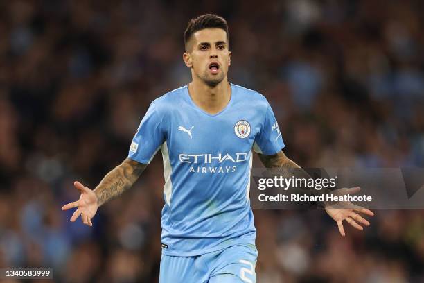 Joao Cancelo of Manchester City celebrates after scoring their side's fifth goal during the UEFA Champions League group A match between Manchester...