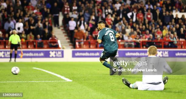 Onel Hernandez of Middlesbrough beats Ethan Horvath of Nottingham Forest to score his teams second goal during the Sky Bet Championship match between...