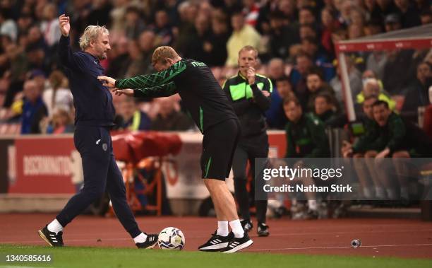 Stoke City coach Dean Holden clashes with Barnsley manager Markus Schopp on the touchline, Holden is subsequently red carded during the Sky Bet...