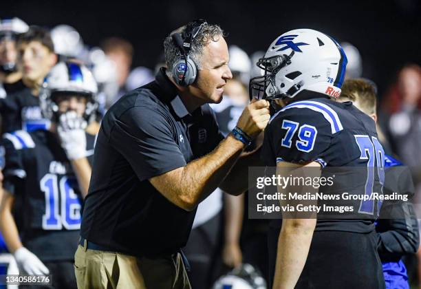 Reiffton, PA Exeter head football coach Matt Bauer and Exeter's Cole Heckman . High School football, the Wilson Bulldogs vs. The Exeter Eagles at Don...