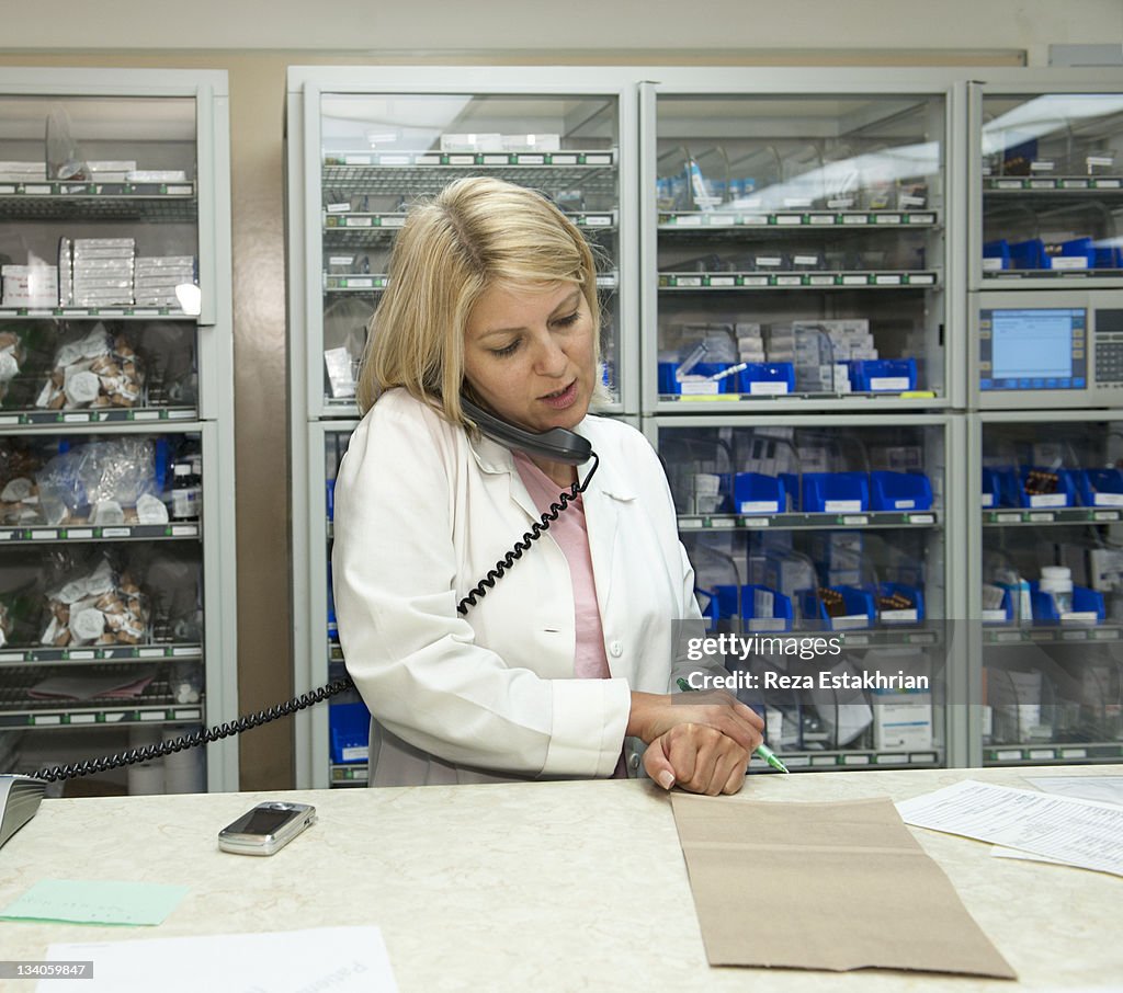 Pharmacist on telephone