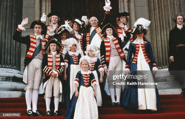 From left to right, British actors Julian Rhind-Tutt, Helen Mirren, Nigel Hawthorne , Rupert Everett and Julian Wadham with the royal children in a...
