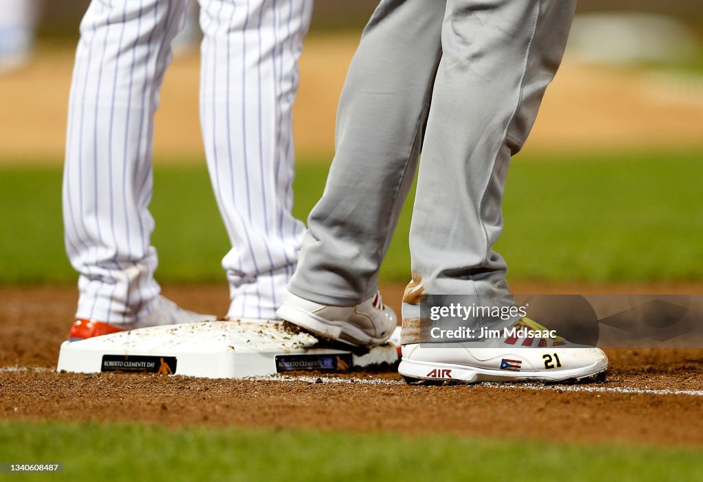 The cleats of Yadier Molina of the St. Louis Cardinals are seen as he  News Photo - Getty Images