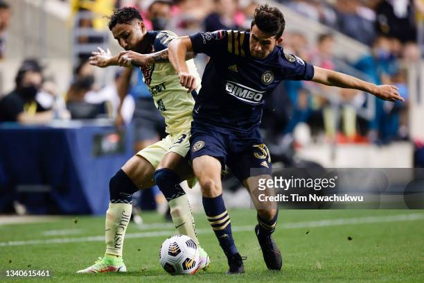 Jorge Sánchez of Club America and Leon Flach of Philadelphia Union battle for possession during the first half during the semifinal second leg match...