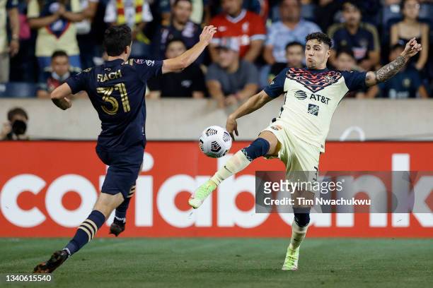 Jorge Sánchez of Club America and Leon Flach of Philadelphia Union battle for possession during the first half during the semifinal second leg match...