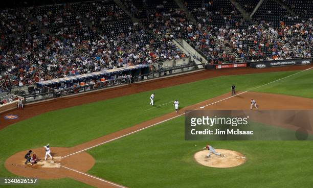 Jon Lester of the St. Louis Cardinals pitches to Javier Baez of the New York Mets during the fifth inning at Citi Field on September 15, 2021 in New...