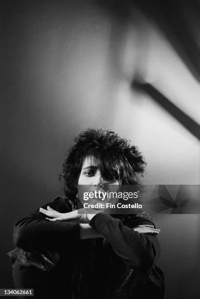 1st NOVEMBER: Siouxsie Sioux, lead singer with British punk band Siouxsie And The Banshees posed with hands crossed in a studio in London in November...