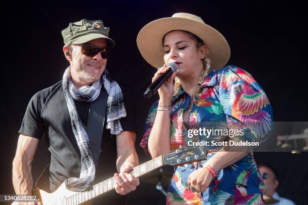 Musicians Eric Hilton and Loulou Ghelichkhani of Thievery Corporation performs onstage during day 3 of the Beach Life Music Festival on September 12,...