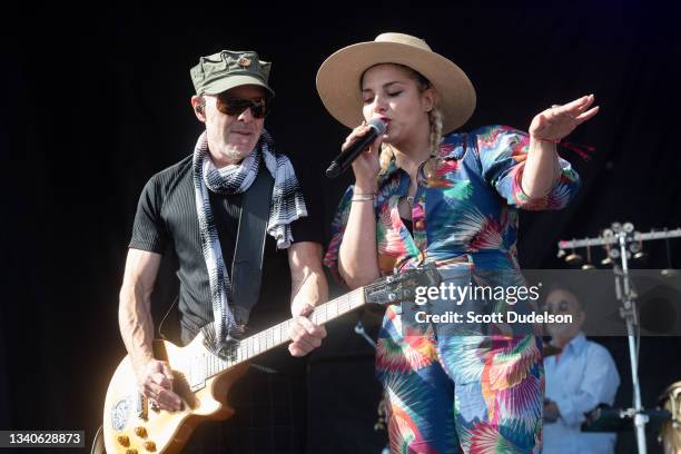 Musicians Eric Hilton and Loulou Ghelichkhani of Thievery Corporation performs onstage during day 3 of the Beach Life Music Festival on September 12,...