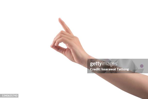 abstract young woman's hand on white background - hand pointing stock pictures, royalty-free photos & images