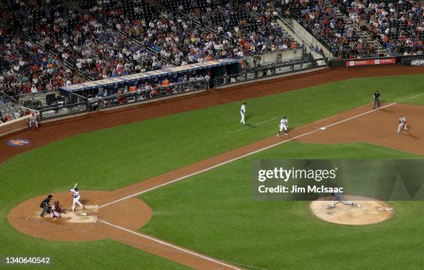 Jon Lester of the St. Louis Cardinals pitches to Javier Baez of the New York Mets during the fifth inning at Citi Field on September 15, 2021 in New...