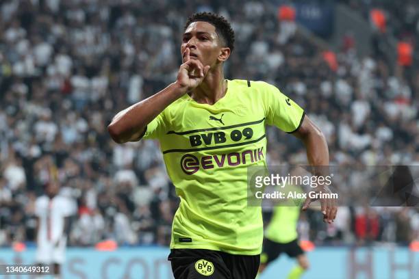 Jude Bellingham of Borussia Dortmund celebrates after scoring their side's first goal during the UEFA Champions League group C match between Besiktas...