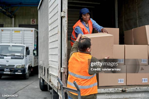 Handling Loading Box Loading Boxes In Truck Photos and Premium High Res Pictures - Getty Images