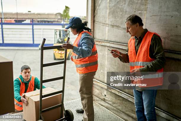 Delivery Rider Behind Lorry Standing Behind Truck Photos and Premium High Res Pictures - Getty Images