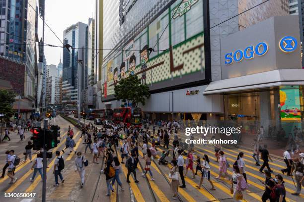 causeway bay in hong kong - sogo stock pictures, royalty-free photos & images