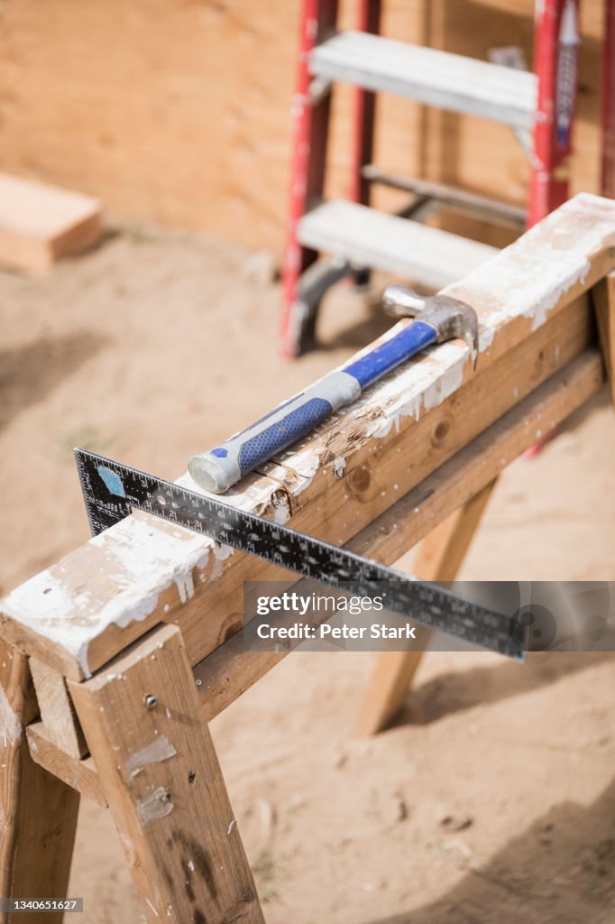 Square Ruler Consruction Hammer And Carpenter Square Ruler At Construction Site High-Res Stock ...