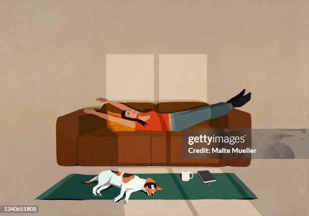 ilustraciones, imágenes clip art, dibujos animados e iconos de stock de carefree woman stretching on sofa in sunny living room - interior de la casa