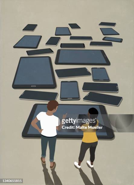 stockillustraties, clipart, cartoons en iconen met couple looking at variety of smart phones and digital tablets - electronic products