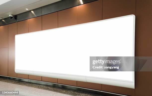 mockup image of blank billboard white screen posters and led in the subway station for advertising - bus advertising stockfoto's en -beelden