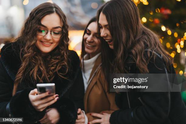 enjoying social media - three people selfie stock pictures, royalty-free photos & images